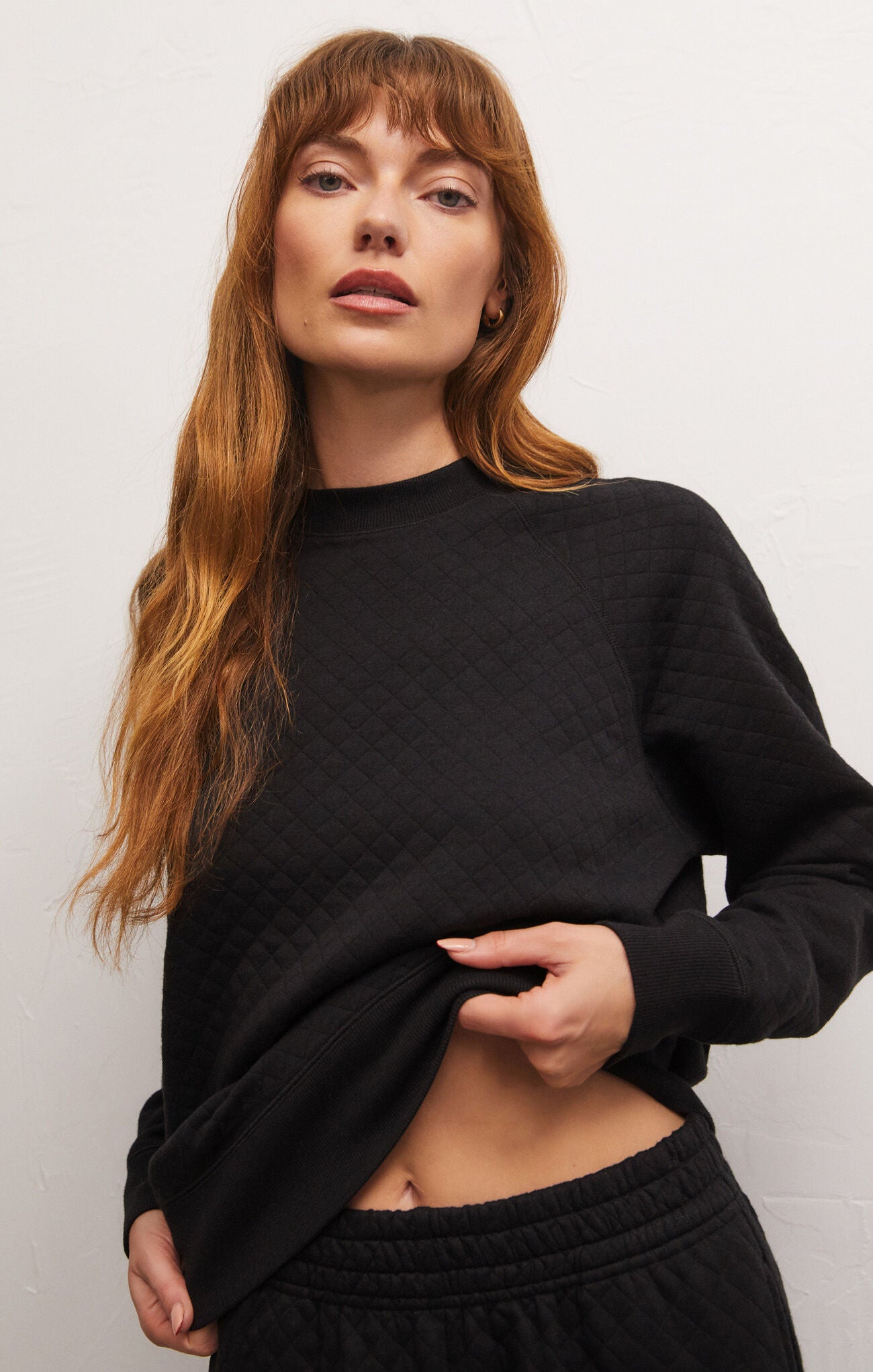 Black discount quilted sweatshirt